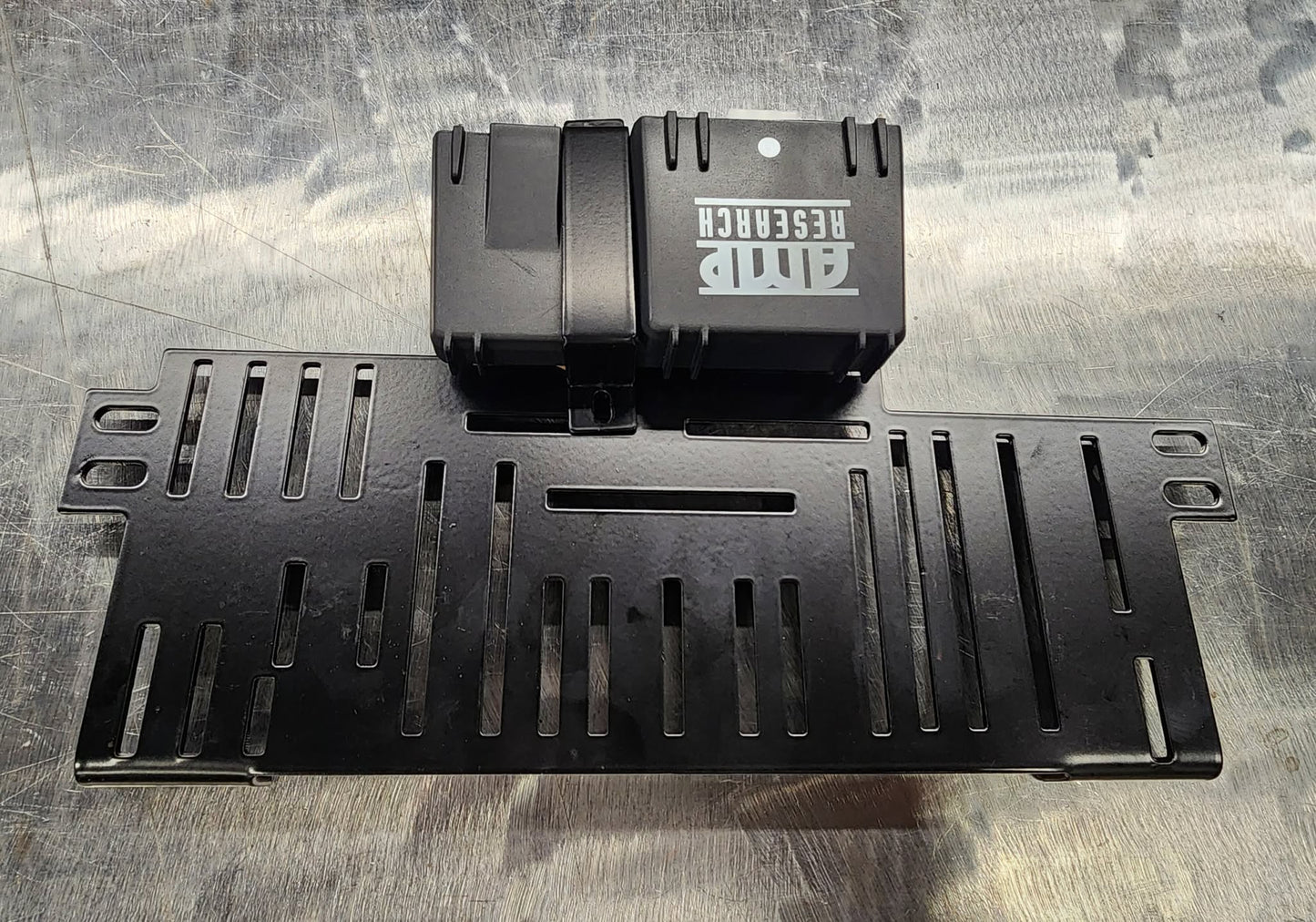 Amp Step Module Bracket
